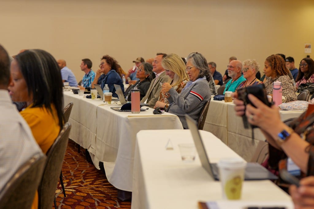 Attendees following along from their seats at an Accelerated Strategies seminar